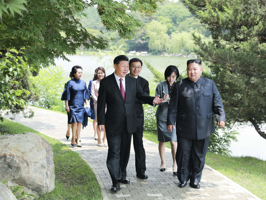 习近平会见朝鲜劳动党委员长、国务委员会委员长金正恩